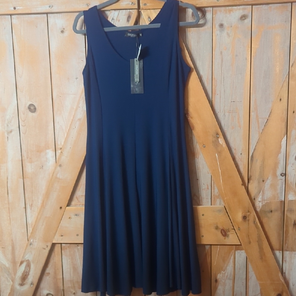 NWT.   CREATION SIZE MEDIUM SUPER CUTE DRESS